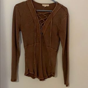 Long sleeve top with lace up detail